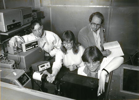 From left: Betsy, Judi Romeo, John, and Elsie Quiate (now Quiate-Randall) prepare to irradiate alfalfa seeds